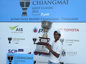 Rashid Khan poses with the trophy after winning the Chiangmai Golf Classic.