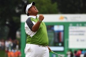 Kiradech celebrates after holing the winning putt. Picture by Getty Images.