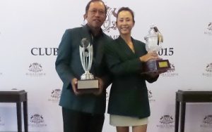Chong Chee Huat and June Yap show off their trophies. 