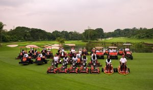 Othman and members of the golf course maintenance team at KLGCC.