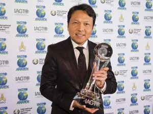 Tanes Petsuwan, Deputy Director, Tourism Authority of Thailand collects the award on behalf of Chiang Mai.