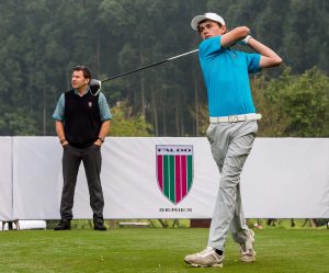 Watched by Sir Nick Faldo, Tom Parker tees-off at the 10th Faldo Series Asia Grand Final. Picture by Xaume Olleros.